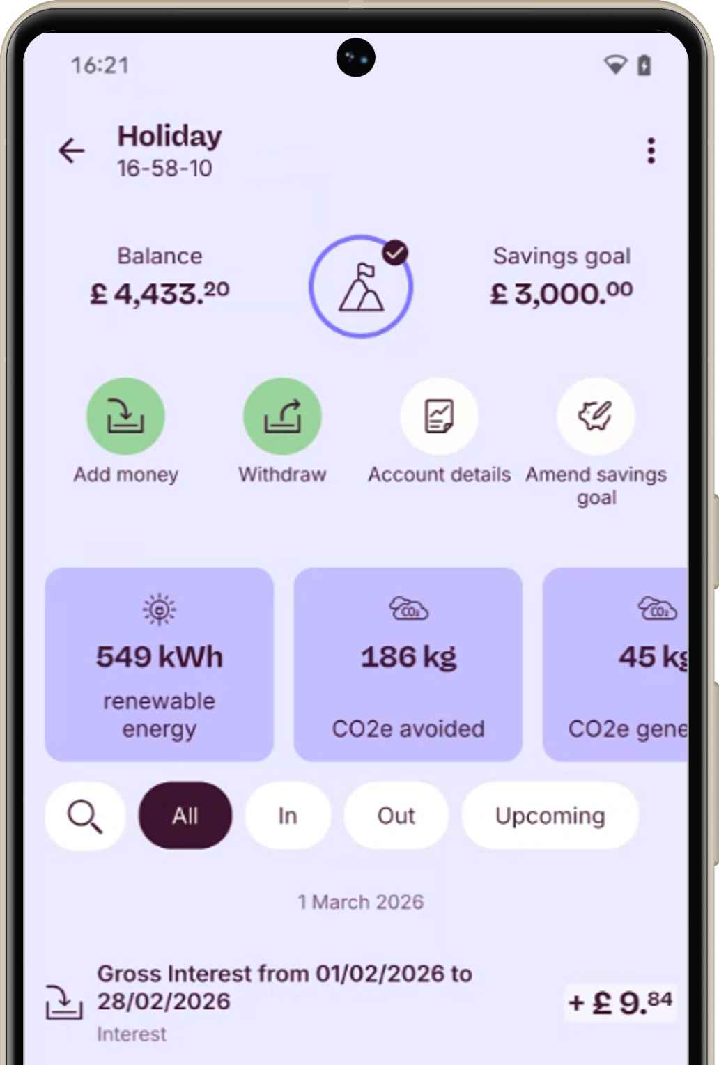 Veritas Union App screen showing balance, a savings goal set to £3000 for a holiday, and impact stats for co2 avoided and renewable energy created.